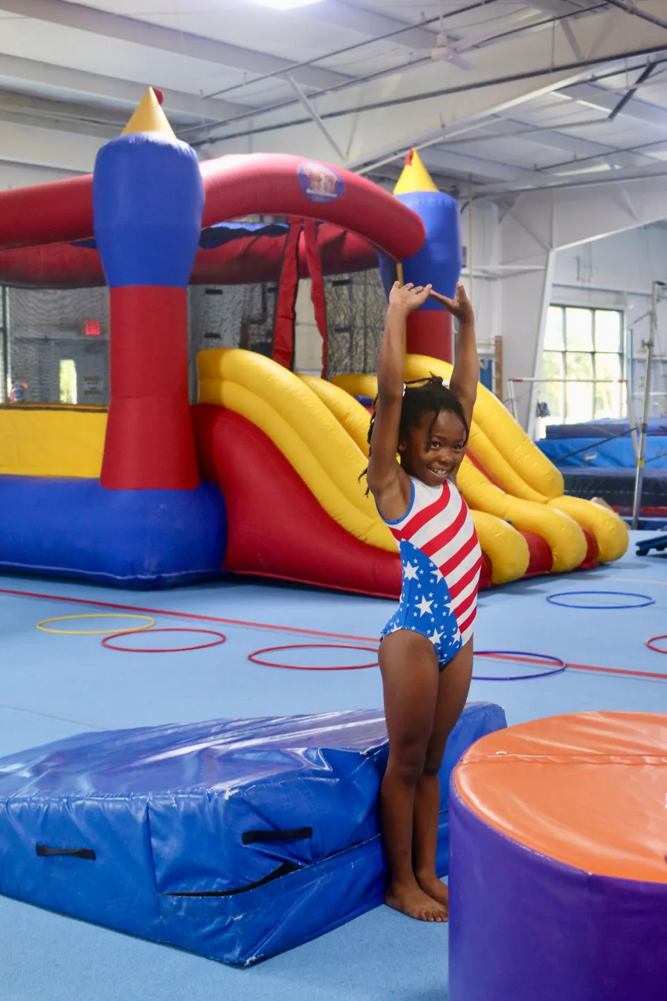 A gymnast practicing in the girls recreational program