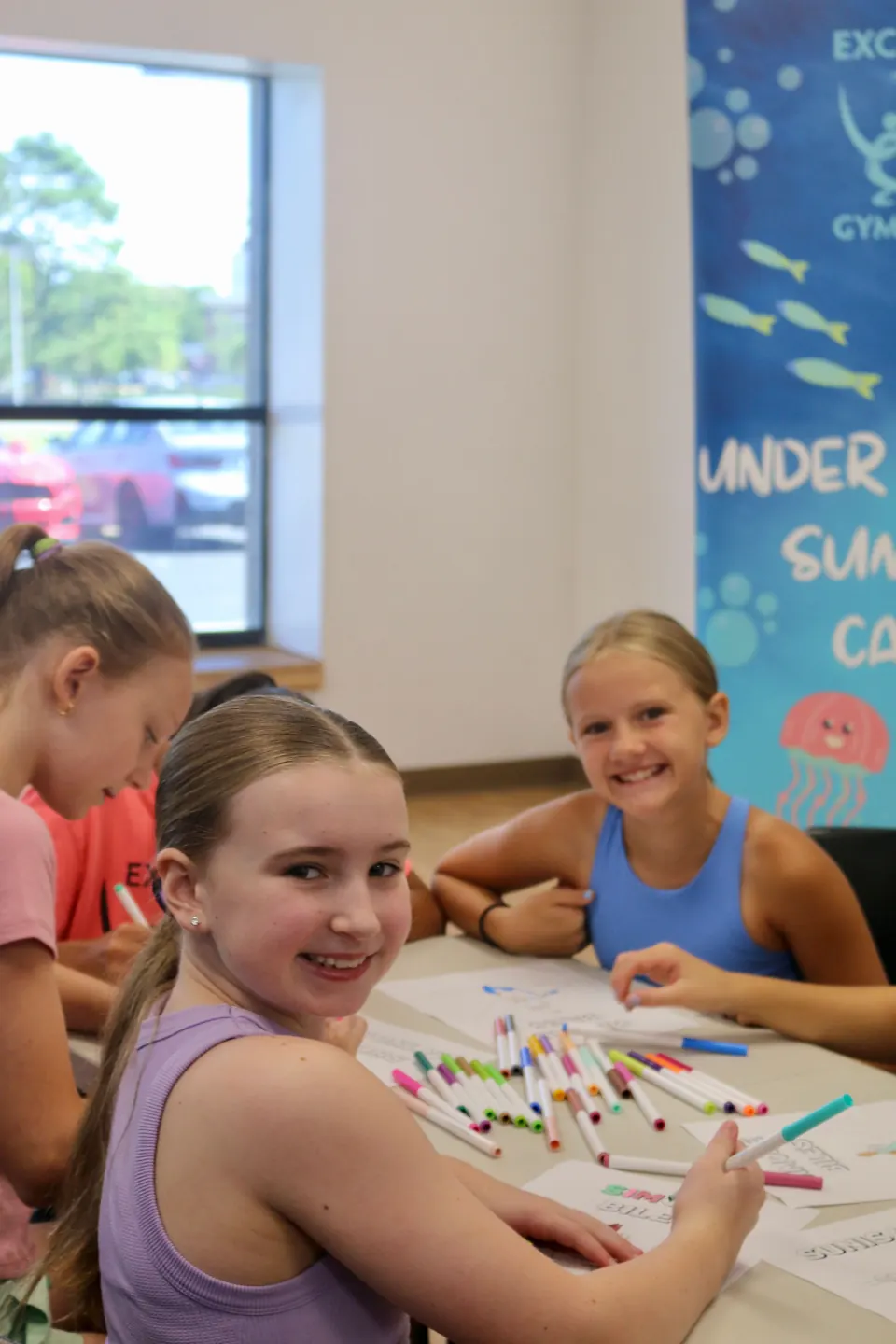 Children enjoying summer camp at Excalibur Gymnastics
